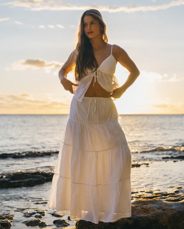 Billabong High Tides Maxi Skirt in white on model at the beach in white cami