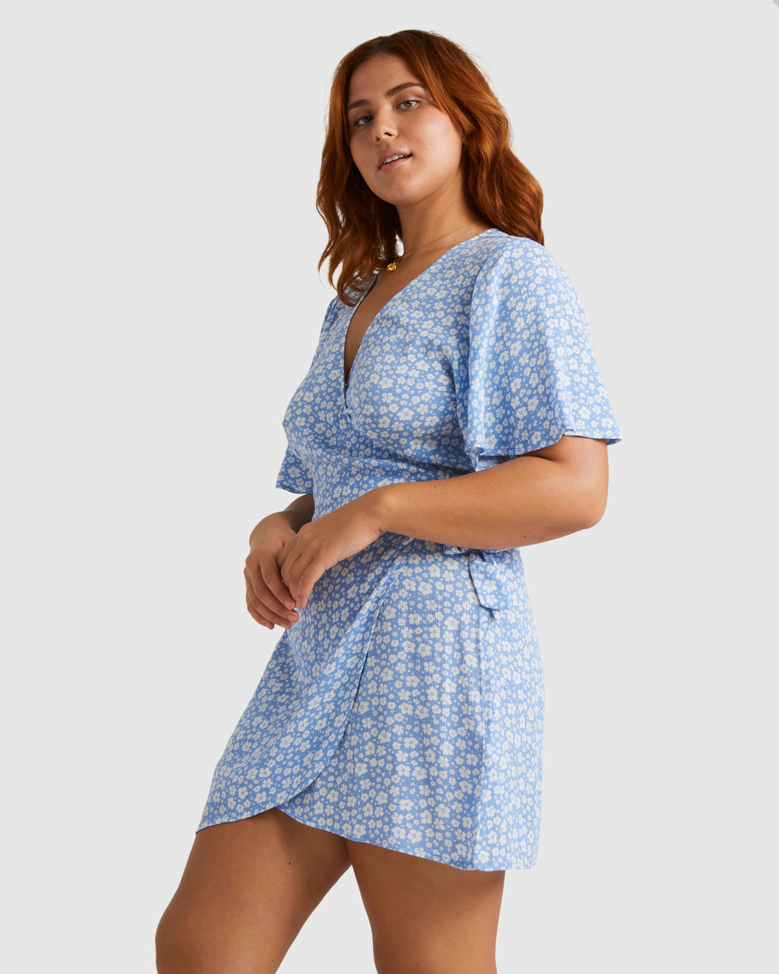 Billabong Holiday Dress in blue from side on red-haired model