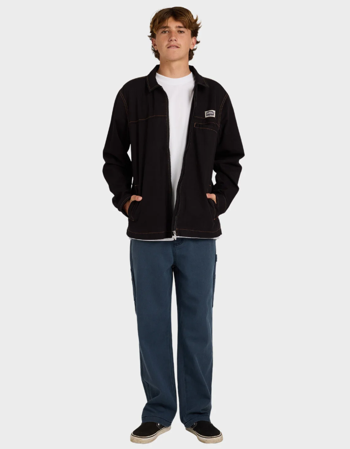 Billabong Jimmy Men's Jacket in black on model in blue jeans and white tee from front