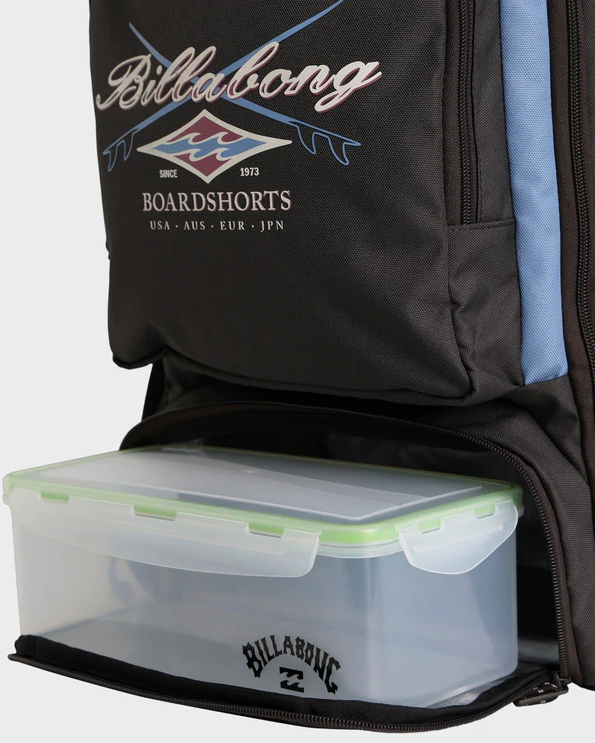 Billabong Juggernaught 30 Litre Backpack in raven colourway from front/side view showing open lower pocket and lunch box