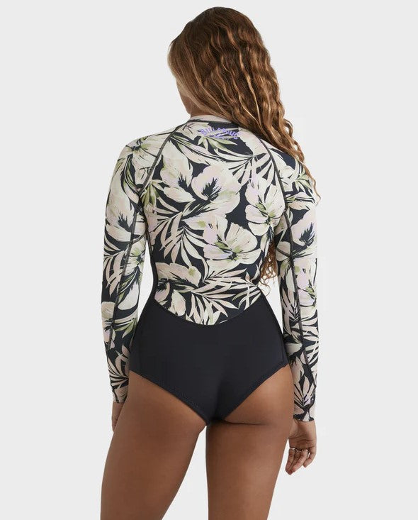 Billabong Salty Dayz Natural 2mm L/S Spring womens Wetsuit in black and floral on model from rear