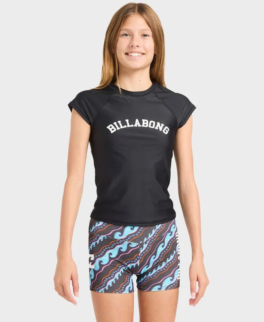 Billabong Sea Level Girls Surf Shorts in off black with multi colour on model in black rash top from front