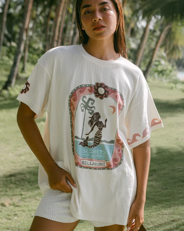 Billabong Secret Beach Women's Oversized T-Shirt in salt crystal colourway on model in front of palm trees