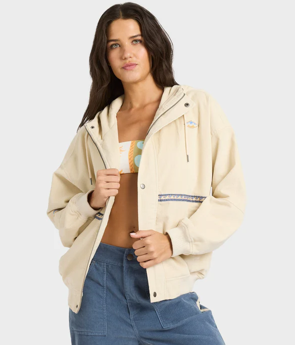Billabong Set The Tone Women's Cord Jacket in white cap colourway on model in blue cord pants and bikini top close up from front