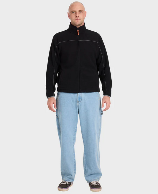 Billabong Smoko Men's Denim Carpenter Jeans in stone blue on model in black billabong polar fleece