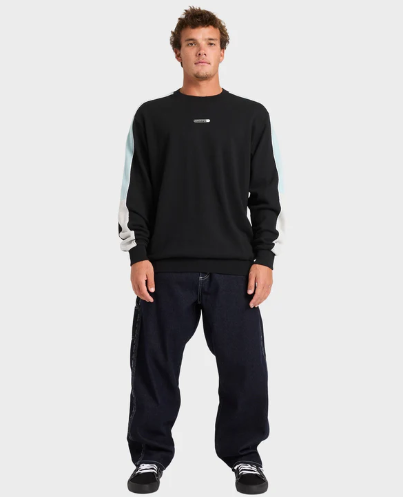 Billabong Spec 73 Chrome Denim Jeans in black on model in Billabong crew from front