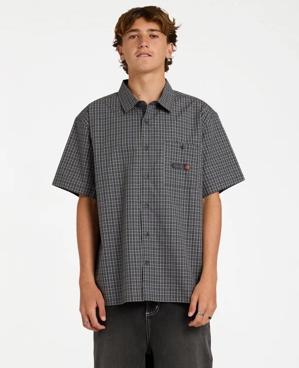Billabong Spec Mogul Short Sleeve Shirt in forest and black check on model from the front close up