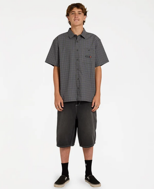 Billabong Spec Mogul Short Sleeve Shirt in forest and black check on model from the front