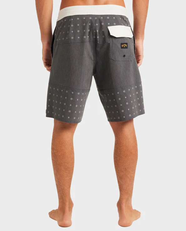 Billabong Tribong Low Tide 19" Boardshorts in washed black with white waistband and details on model from rear