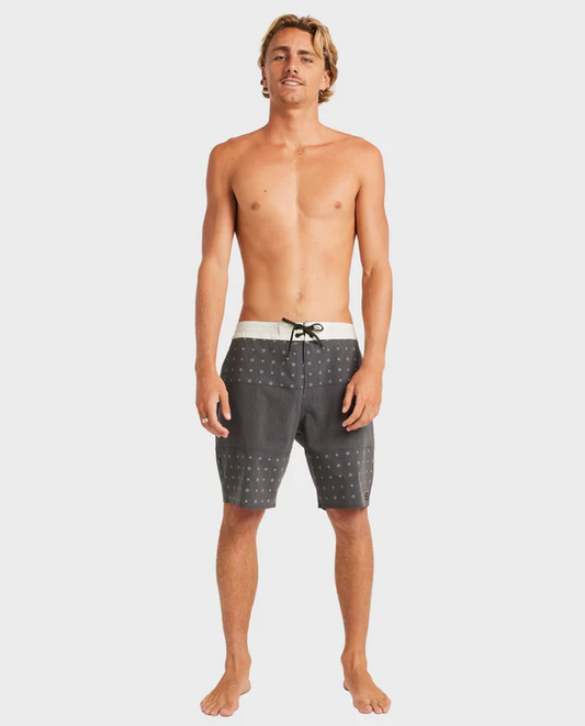 Billabong Tribong Low Tide 19" Boardshorts in washed black with white waistband and details on model from front