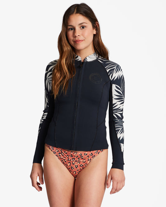 woman wearing the Billabong Womens Peeky 1mm Wetsuit Jacket in paradise colourway