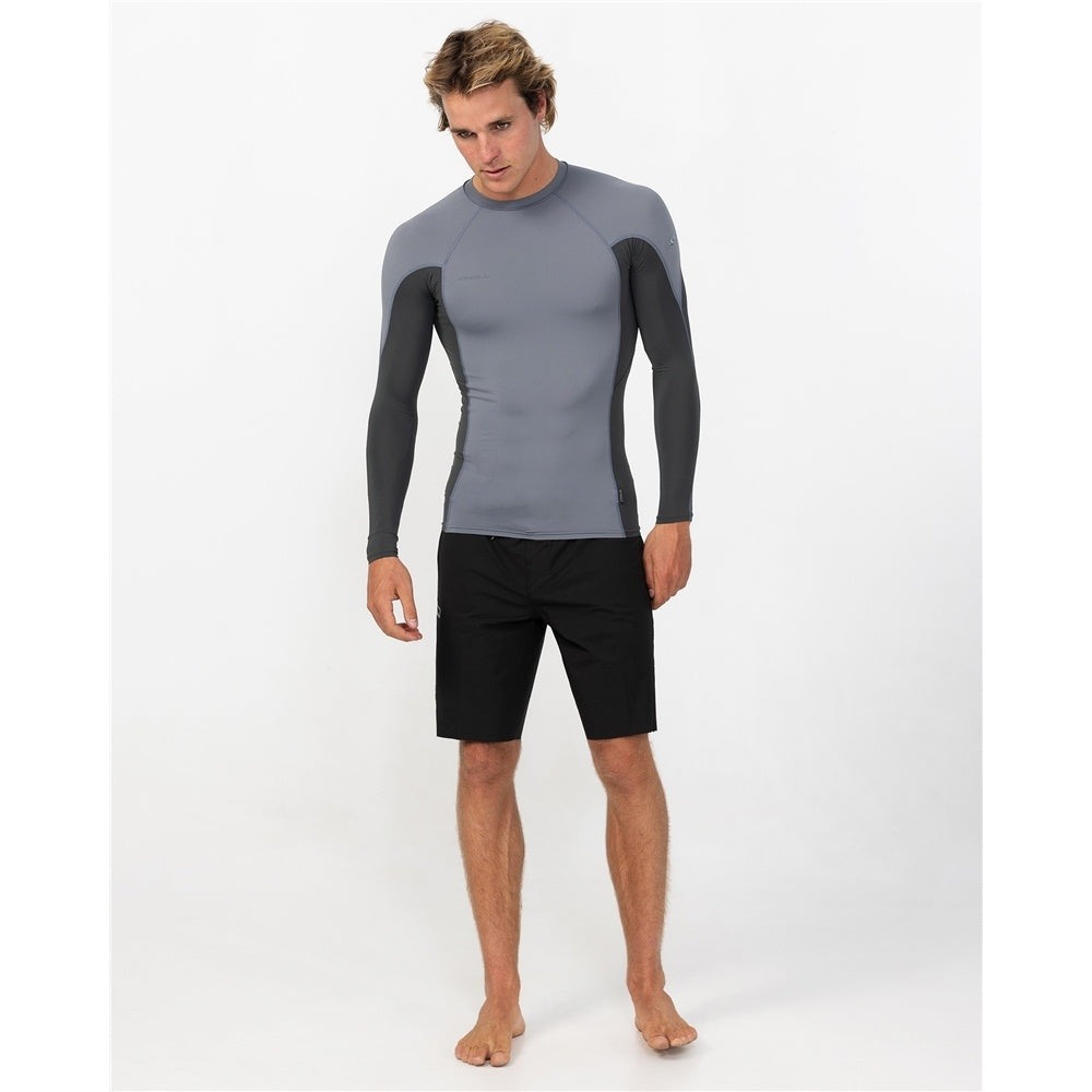 O'Neill Hyperfreak Skins Long Sleeve Rash Guard in dark shadow colourway on model in black boardshorts