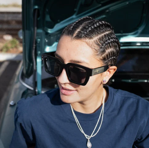 CHPO Brand Max Sunglasses in black on female model