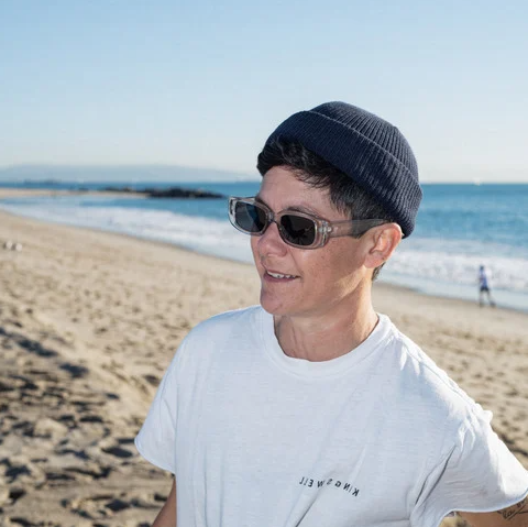 CHPO Brand Nicole Sunglasses in grey colourway on model in black beanie