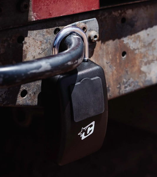 Creatures of Leisure Stash Key Lock - Large in black connected to a car