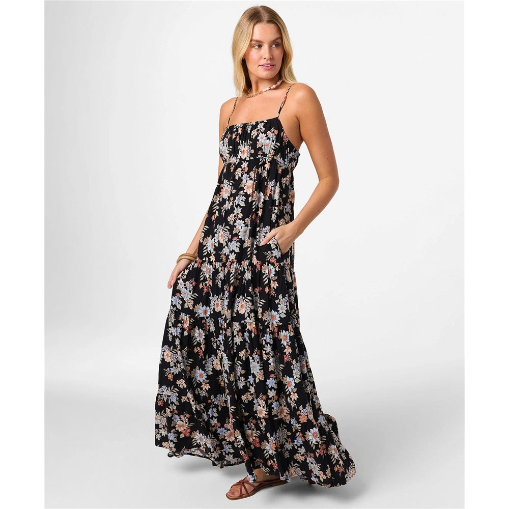 O'Neill Lillie Bali Floral Maxi Dress in black floral print on blonde model from side angle