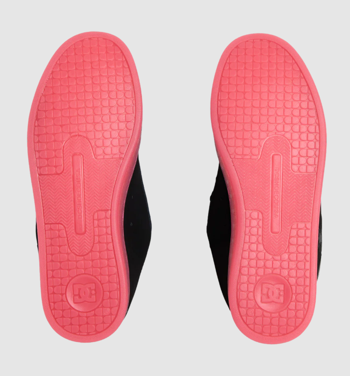 DC Shoes Women's Court Graffik Shoes in black with pink soles showing the soles from underneath