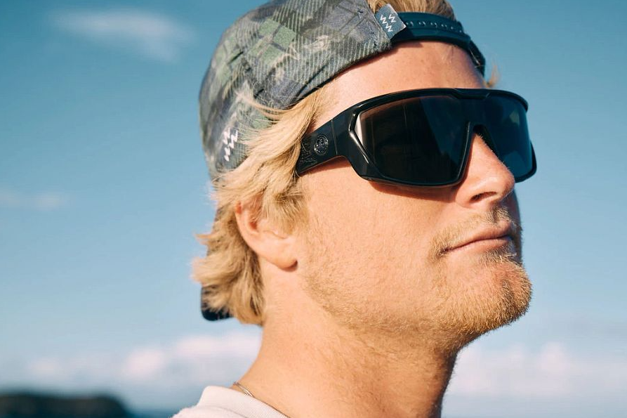 Dragon Chasm Matte Black Lumalens Smoke Sunglasses on model