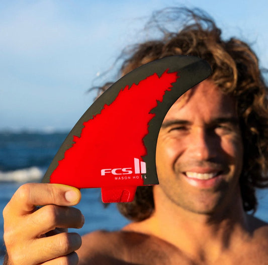 FCS II MH Mason Ho PC Aircore Code Red Fins - large held by Mason himself