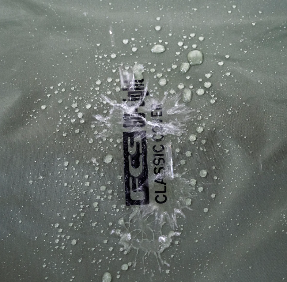 FCS 9'2 Classic Longboard Day Bag in alpine colourway showing top of bag showing Go-Light logo getting splashed