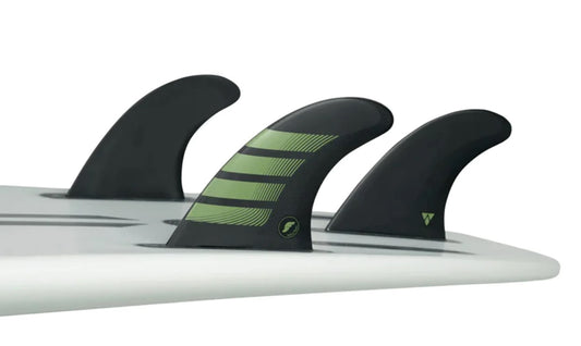 Futures Alpha Carbon F8 Large Thruster surfboard Fin Set in black with olive colour in surfboard