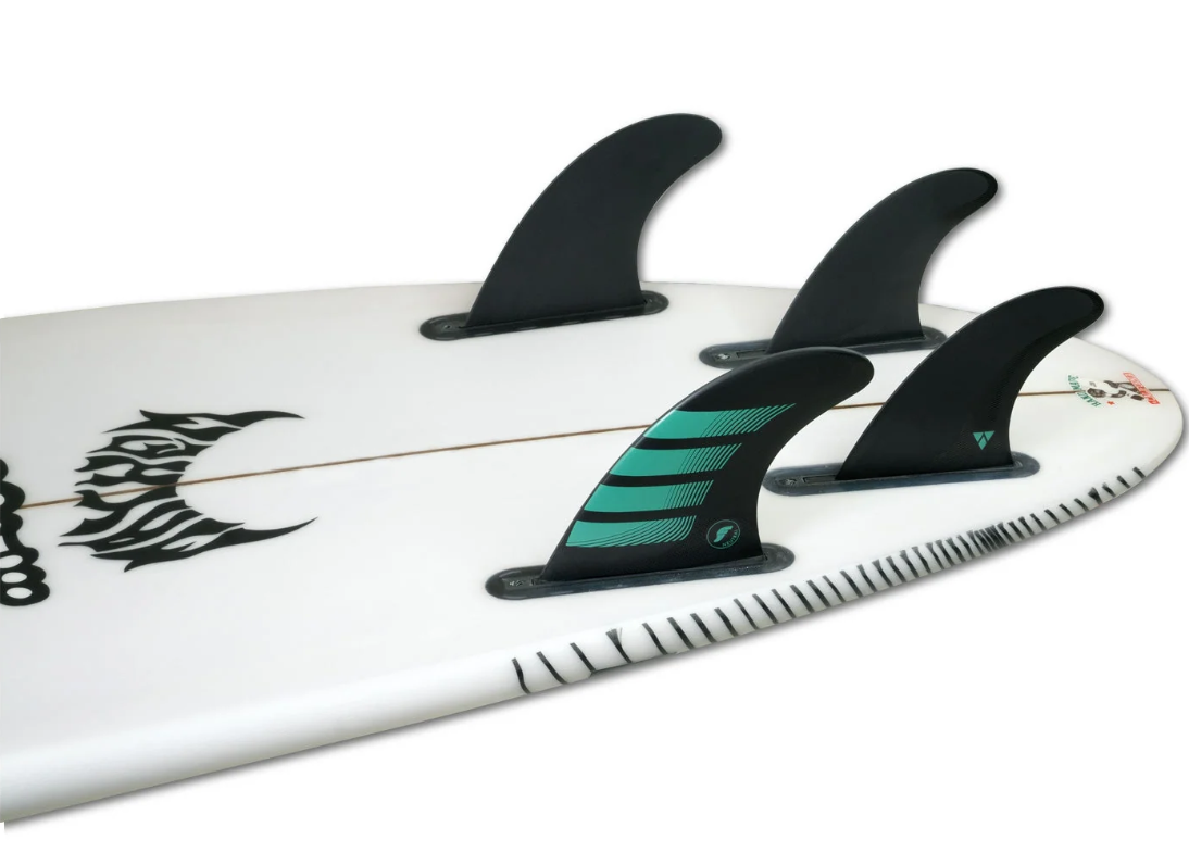 Futures Fins F6 Alpha 5 Surfboard Fin Set (medium) showing 4 of the fins in a surfboard