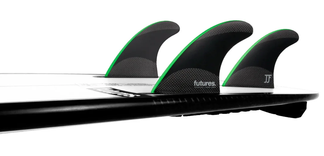Futures John John Signature Techflex Thruster Fin Set showing black and green medium set in board