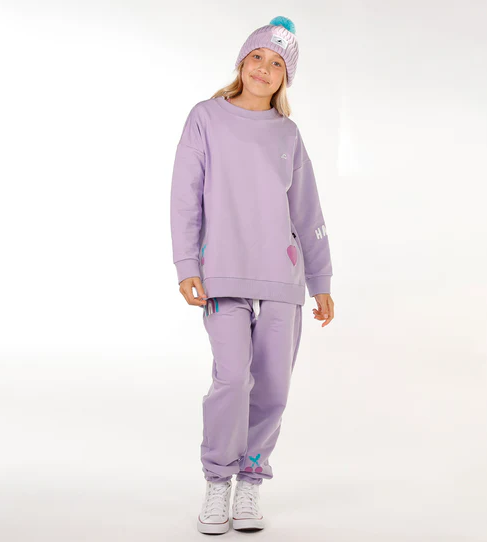 Hello Stranger Girls Mermaid Crew in lavendar on model in Hello stranger trackpants from front