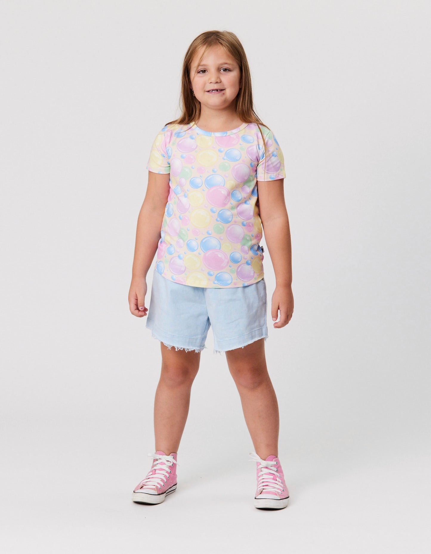 Kissed By Radicool Bubbly Tee in multi colour from front on model