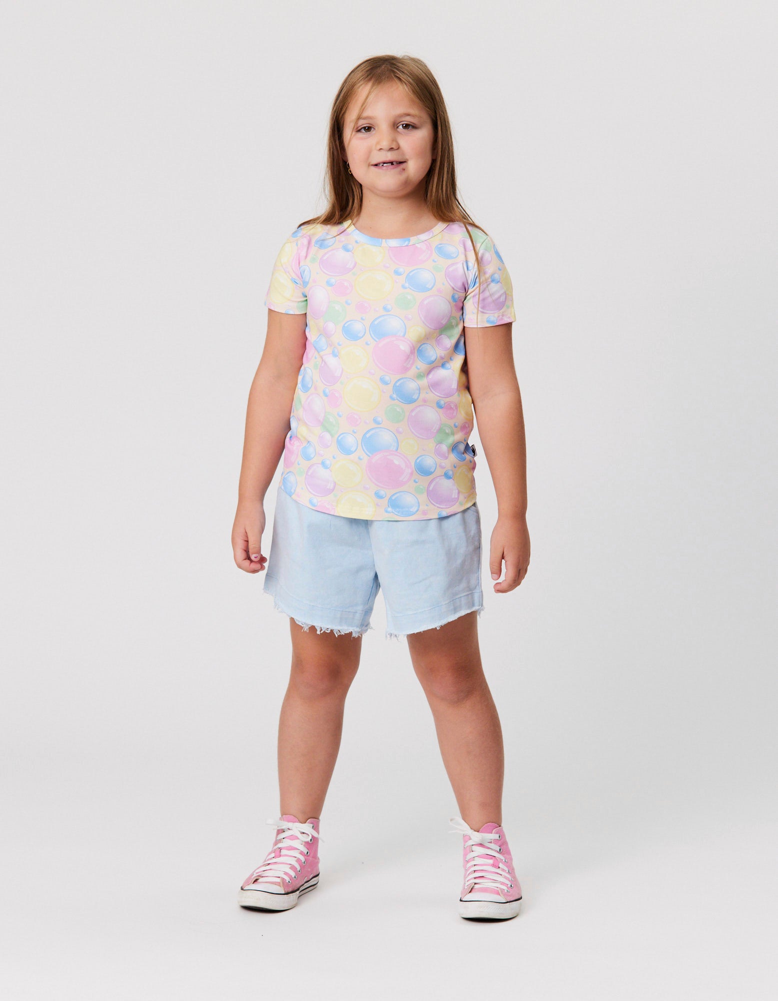 Kissed By Radicool Bubbly Tee in multi colour from front on model