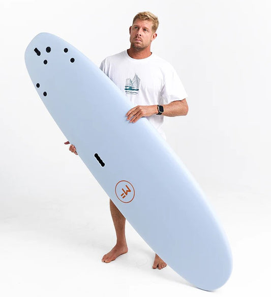 Mick Fanning 7'0 Beastie Supersoft Softboard in sky colourway held by Mick Fanning