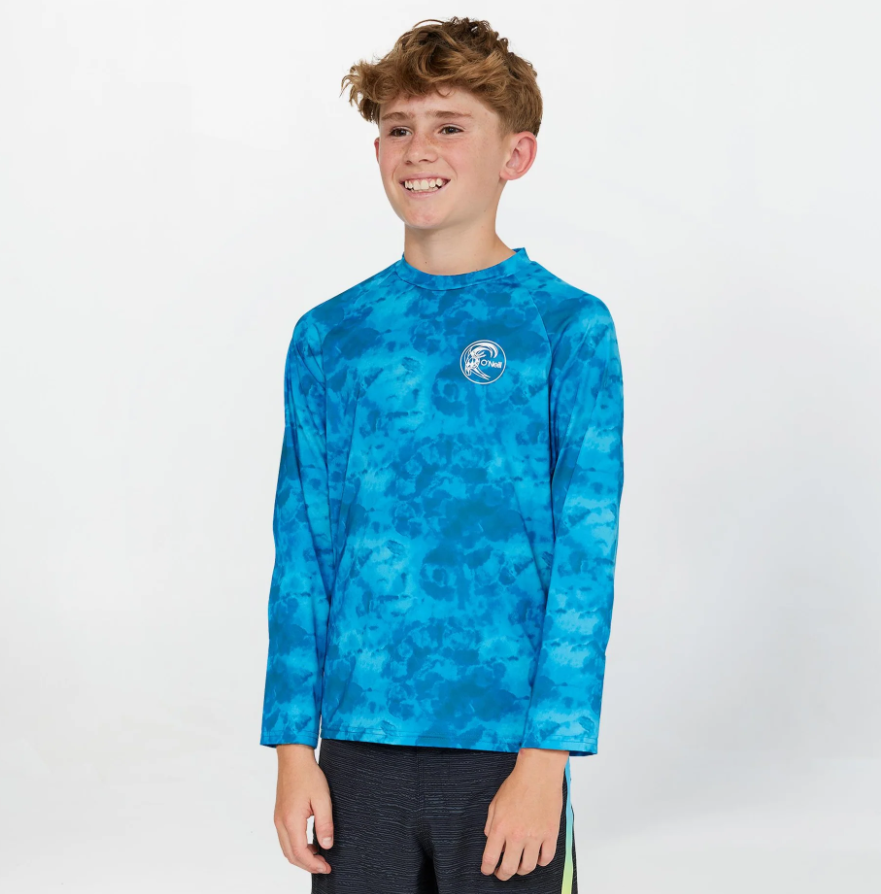 O'Neill Boys Dopedye Long Sleeve UV Rash Tee in trippy surf blue on model from the front close up