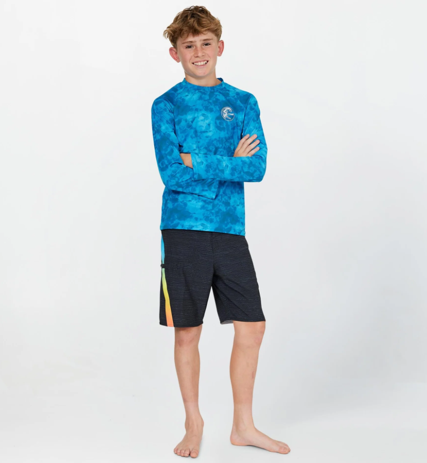 O'Neill Boys Dopedye Long Sleeve UV Rash Tee in trippy surf blue on model from the front