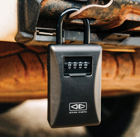 Ocean and Earth Key Vault Lock hanging off a car tow bar