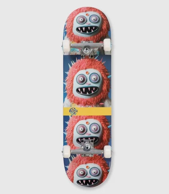 Push 8.25 Frosty FP Complete Skateboard in multi colour with monster's head repeating in the graphics