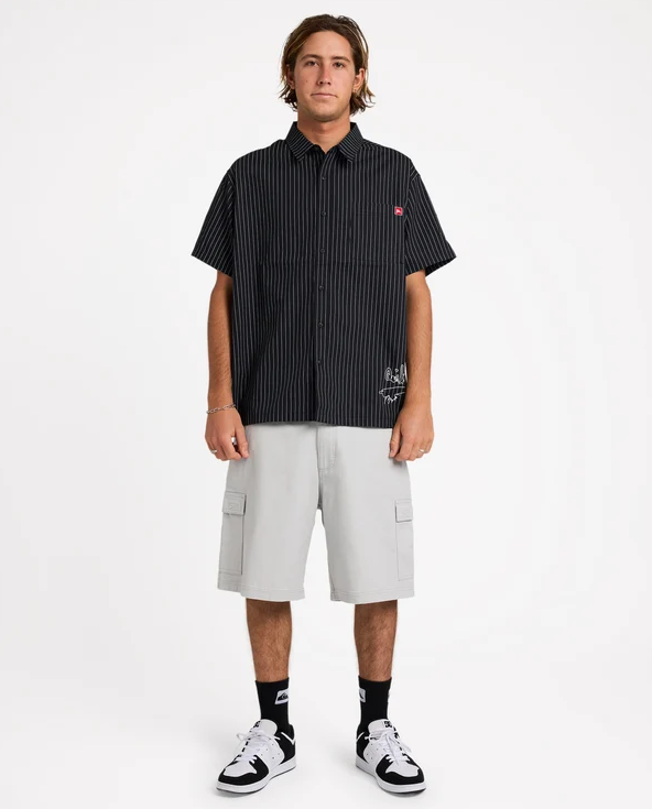 Quiksilver 04S 21" Cargo Shorts in grey on model in pinstripe shirt from the front