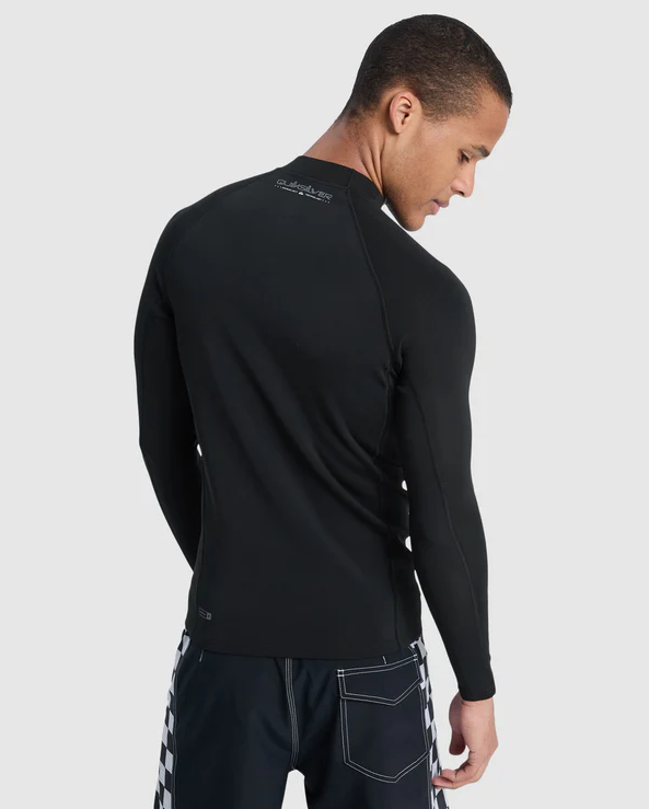Quiksilver Everyday Heat Thermal Long Sleeve Rash Top in black on model from  rear