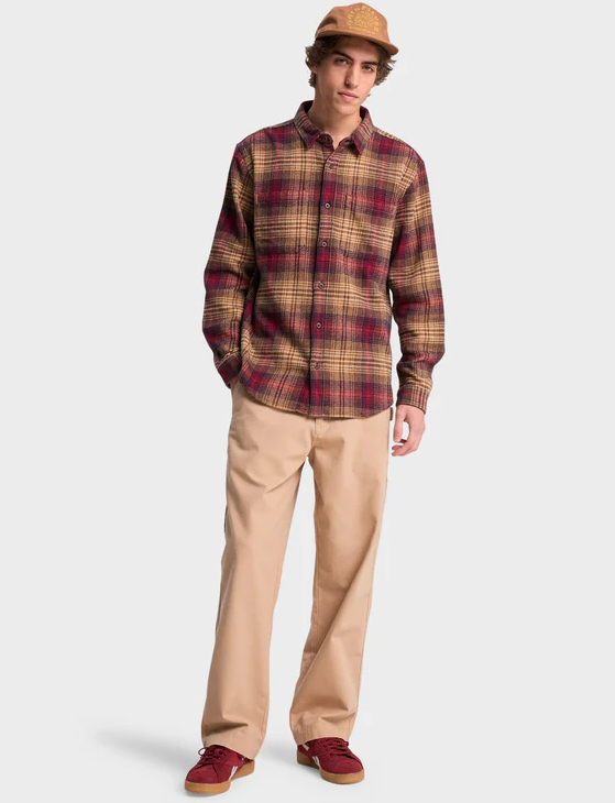 Quiksilver DNA Men's Flannel Shirt in tobacco red check on model in khaki trousers from front