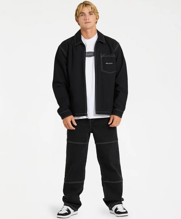 Quiksilver Mercury Coach Jacket
 in black on model in baggy black jeans from front