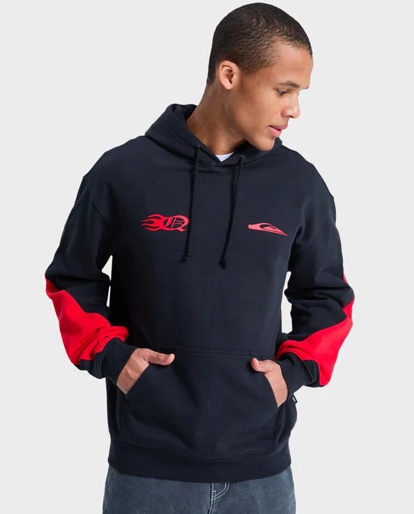 Quiksilver Mercury Trident Hoodie in black wirth red detailing on model in blue Quiksilver shorts close up form front