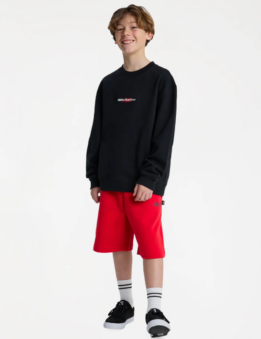 Quiksilver Mercury Trident Youth Crew in black on model in red shorts from front