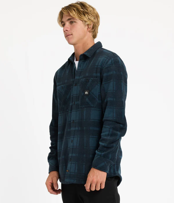 Quiksilver North Seas Expedition Long Sleeve Polar Shirt in midnight navy checked colourway on model from side