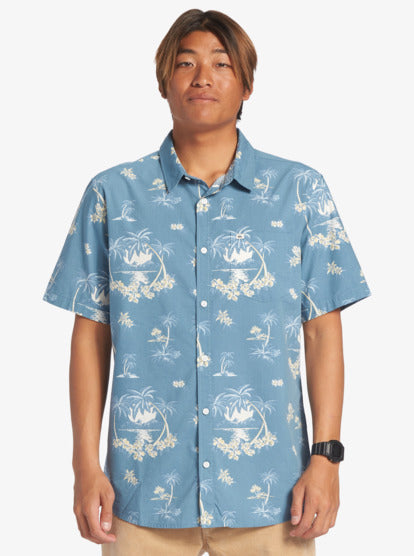 Quiksilver Palm Spritz Short Sleeve Shirt in agean blue on model with hawaiian design