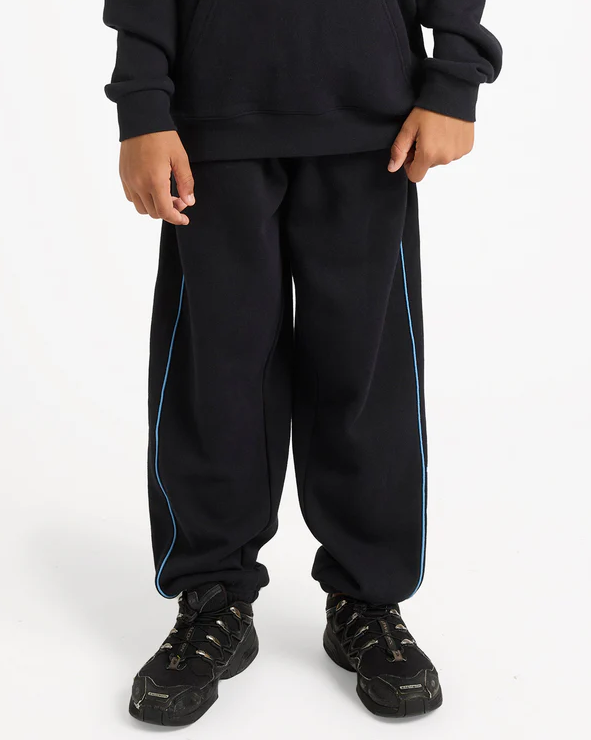 Quiksilver Panelled Youth Trackpants in black with blue piping from front