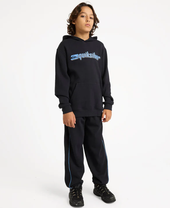 Quiksilver Panelled Youth Trackpants in black with blue piping on youth model in black Quiksilver hoodie