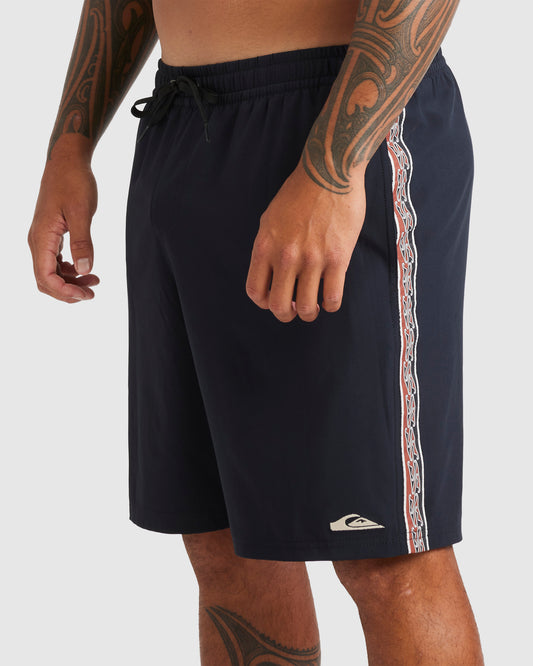 Quiksilver Pu Tawhiro Kehu Volley Shorts in  black with maori design side panel from side