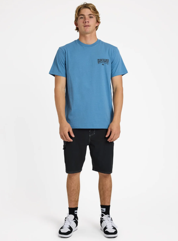 The Quiksilver Strike Mission Watermans Tee in coronet blue on model from front
