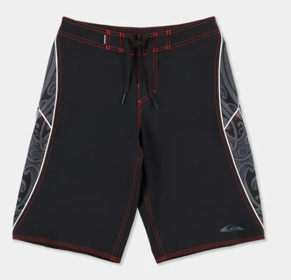 Quiksilver Tai Kehu Boys Takarangi 19" Boardshorts in black with Maori designs from the front