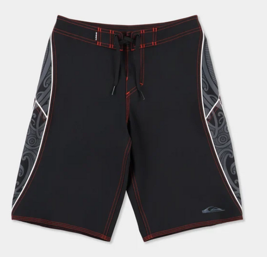 Quiksilver Tai Kehu Boys Takarangi 19" Boardshorts in black with Maori designs from the front