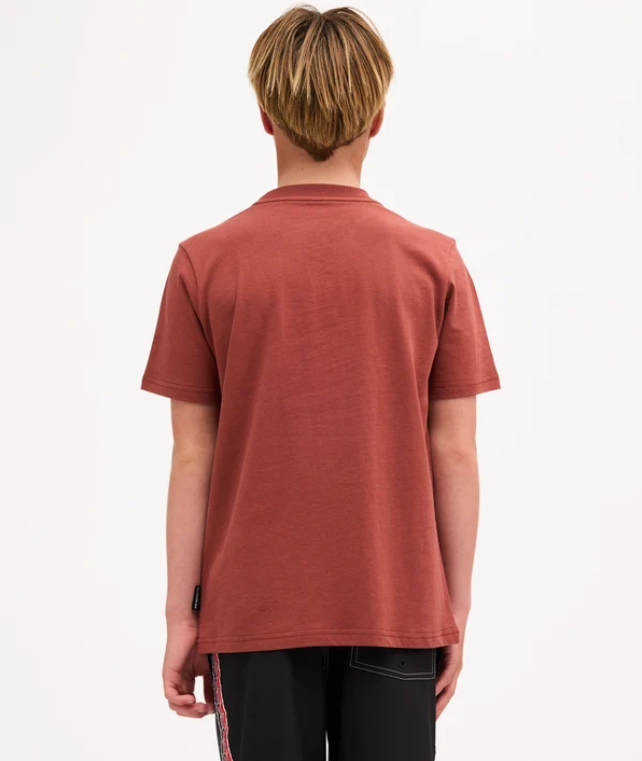 Quiksilver Tai Kehu Takarangi Panel Boys T-Shirt in henna colourway on youth model in Maori boardshorts from the back